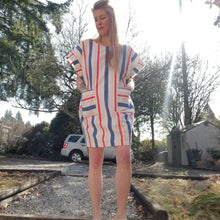 Load image into Gallery viewer, A classic oversized tunic dress for the everyday. Featuring a scoop neckline with an extended shoulder, loose fitting sleeve bands and front patch pockets. This dress will give you all the old school feels of the 80&#39;s, made in a vintage antique washed cotton it&#39;ll have you seeking lil&#39; miss sunshine!
