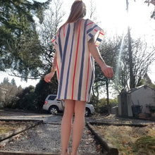 Load image into Gallery viewer, A classic oversized tunic dress for the everyday. Featuring a scoop neckline with an extended shoulder, loose fitting sleeve bands and front patch pockets. This dress will give you all the old school feels of the 80&#39;s, made in a vintage antique washed cotton it&#39;ll have you seeking lil&#39; miss sunshine!
