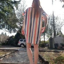 Load image into Gallery viewer, A classic oversized tunic dress for the everyday. Featuring a scoop neckline with an extended shoulder, loose fitting sleeve bands and front patch pockets. This dress will give you all the old school feels of the 80&#39;s, made in a vintage antique washed cotton it&#39;ll have you seeking lil&#39; miss sunshine!
