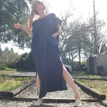 Load image into Gallery viewer, A classic oversized tunic dress for the everyday. This is a Maxi/Ankle length version of one of our bestselling dresses, the BANDED FREEDOM DRESS. Featuring a scoop neckline with an extended shoulder with loose fitting sleeve bands + patch pockets, along with the addition of double side slits on this longer version for complete ease of movement + comfortability. Designed for the days spent lounging around the house, playing in the garden, reading a good book + working in your home office, this dress is so v
