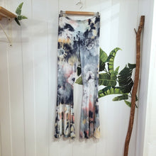Load image into Gallery viewer, The perfect flares for everyday. Featuring a wide high rise waistband with a fitted leg flaring out from the knees. This is a unique and original hand-dyed pant using non-toxic dyes in our organic bamboo rib knit fabric that is so luxuriously soft + comfy, you won&#39;t want to take them off!
