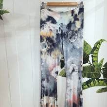 Load image into Gallery viewer, The perfect flares for everyday. Featuring a wide high rise waistband with a fitted leg flaring out from the knees. This is a unique and original hand-dyed pant using non-toxic dyes in our organic bamboo rib knit fabric that is so luxuriously soft + comfy, you won&#39;t want to take them off!

