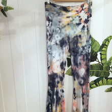 Load image into Gallery viewer, The perfect flares for everyday. Featuring a wide high rise waistband with a fitted leg flaring out from the knees. This is a unique and original hand-dyed pant using non-toxic dyes in our organic bamboo rib knit fabric that is so luxuriously soft + comfy, you won&#39;t want to take them off!
