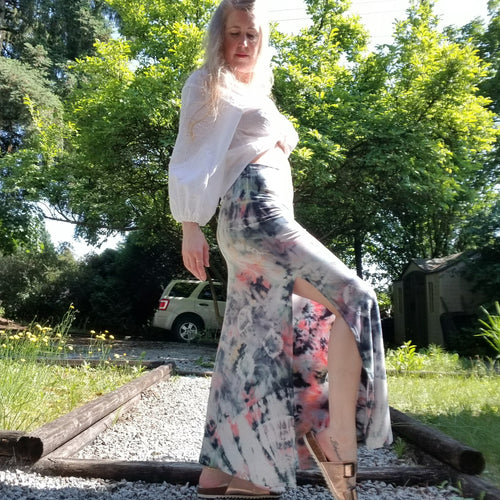 The imagery you'll discover in these handcrafted beauties is endless. Not only is this the perfect skirt for everyday, it'll be the most fun you'll enjoy wearing and having endless conversations about too! The perfect maxi skirt for everyday. Featuring a wide waistband and an A-line body with a long ankle length hem and double side slits. This is a unique and original hand-dyed skirt using non-toxic dyes in our organic bamboo knit fabric that is so luxuriously soft + comfy, you won't want to take if off!