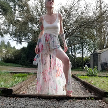 Load image into Gallery viewer, The perfect easy breezy summertime pant for the everyday! Handcrafted in a lightweight watercolor print, these beauties feature a high rise elasticized waist, pockets for that ultra casual feel, these free flowing flared pants feature thigh high front leg slits that&#39;ll keep you ultra stylish and oh so cool on those hot summer days and evenings!
