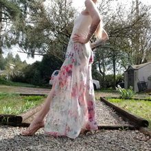 Load image into Gallery viewer, The perfect easy breezy summertime pant for the everyday! Handcrafted in a lightweight watercolor print, these beauties feature a high rise elasticized waist, pockets for that ultra casual feel, these free flowing flared pants feature thigh high front leg slits that&#39;ll keep you ultra stylish and oh so cool on those hot summer days and evenings!
