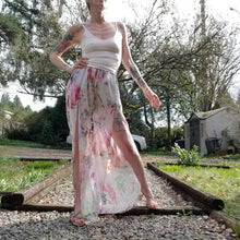 Load image into Gallery viewer, The perfect easy breezy summertime pant for the everyday! Handcrafted in a lightweight watercolor print, these beauties feature a high rise elasticized waist, pockets for that ultra casual feel, these free flowing flared pants feature thigh high front leg slits that&#39;ll keep you ultra stylish and oh so cool on those hot summer days and evenings!
