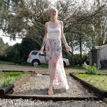 Load image into Gallery viewer, The perfect easy breezy summertime pant for the everyday! Handcrafted in a lightweight watercolor print, these beauties feature a high rise elasticized waist, pockets for that ultra casual feel, these free flowing flared pants feature thigh high front leg slits that&#39;ll keep you ultra stylish and oh so cool on those hot summer days and evenings!
