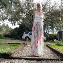 Load image into Gallery viewer, The perfect easy breezy summertime pant for the everyday! Handcrafted in a lightweight watercolor print, these beauties feature a high rise elasticized waist, pockets for that ultra casual feel, these free flowing flared pants feature thigh high front leg slits that&#39;ll keep you ultra stylish and oh so cool on those hot summer days and evenings!
