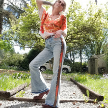 Load image into Gallery viewer, Your wardrobe will thank you and your booty will love you with these 70&#39;s inspired UPCYCLED Driftwood Jeans. Featuring embroidered suede patchwork tuxedo side panels accented with gold studs, also found on the back pockets, and 3 hand embroidered script&#39;s including our signature &#39;LOVED&#39; and &#39;ROCK STAR&#39; found on the bottom bsck legs, because we all have an inner rock star and we should all feel loved, everyday!&nbsp;
