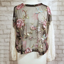 Load image into Gallery viewer, A uniquely mystical one of a kind top. Featuring a scoop neckline, long balloon sleeves and a loose flowy waist length hemline. Handcrafted in a wondrous hummingbird with florals embroidered sheer mesh with romantic chic cream lace sleeves and back. Wear freely on it&#39;s own or layer with any of our tank tops. Perfect for day to night in complete romantic style!
