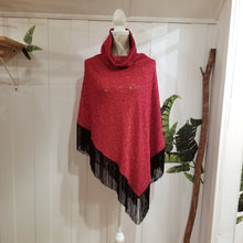 Load image into Gallery viewer, Elevate your look with this one of a kind poncho! The deep red color is perfect for the Fall/Winter season, and heavy lace fabric has a beautiful weighted feel and features a fringed edge that create a very chic and fine finish to any outfit on it&#39;s own or layered over your favorite jean jacket or coat! You will enjoy this piece for year&#39;s to come!
