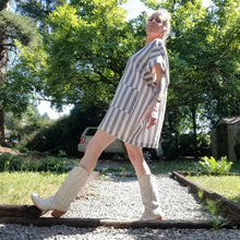 Load image into Gallery viewer, A classic oversized tunic dress for the everyday. This is a 2&quot; shorter version than our regular Banded Freedom Dress. Featuring a scoop neckline with an extended shoulder with loose fitting sleeve bands + patch pockets. Designed for the days spent lounging around the house, playing in the garden, reading a good book + working in your home office, this dress is so versatile. Feel the comfort in this style + the freedom to do it!
