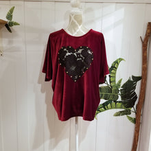 Load image into Gallery viewer, The perfect &#39;romantics&#39; shirt for everyday. Featuring a scoop neckline, elbow length sleeves and a loose flowy hemline. Wear freely on it&#39;s own or tuck it in. Made in an ultra luscious stretch velvet and features a see through lace heart framed with golden studs. So luxuriously soft + comfy you won&#39;t want to take if off!
