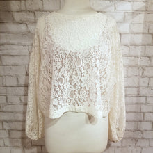 Load image into Gallery viewer, A sweet romantic top for everyday. Featuring a scoop neckline, long balloon sleeves and a loose flowy waist length hemline. Wear freely on it&#39;s own or layer with any of our tops for a unique vintage feeling topper look. Handcrafted in a luscious cream colored corded floral lace, so perfect for day to night in complete romantic style!
