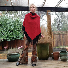 Load image into Gallery viewer, Elevate your look with this one of a kind poncho! The deep red color is perfect for the Fall/Winter season, and heavy lace fabric has a beautiful weighted feel and features a fringed edge that create a very chic and fine finish to any outfit on it&#39;s own or layered over your favorite jean jacket or coat! You will enjoy this piece for year&#39;s to come!
