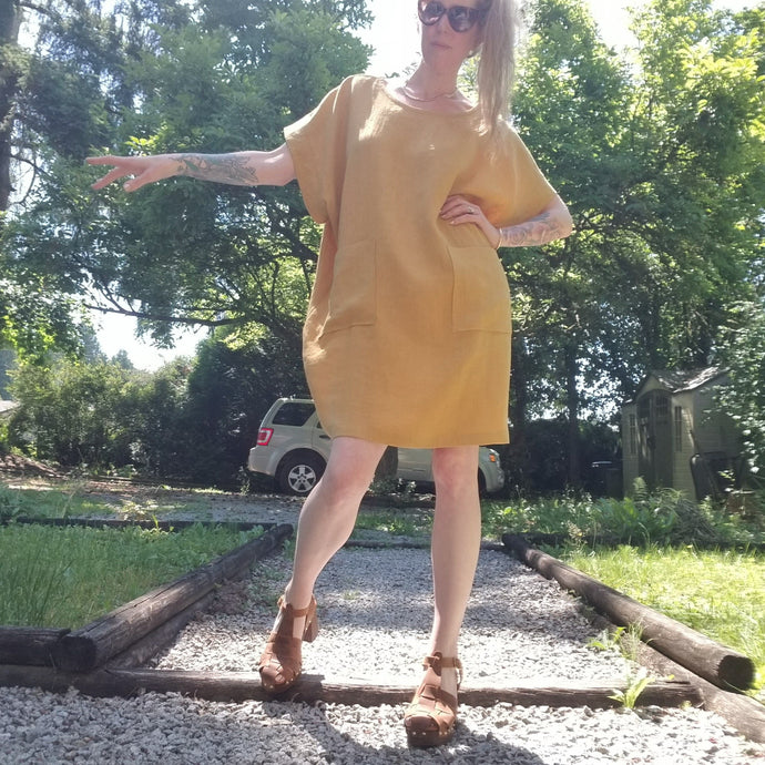 A classic oversized tunic dress for the everyday. Featuring a scoop neckline with an extended shoulder with loose fitting sleeve bands + patch pockets. Designed for the days spent lounging around the house, playing in the garden, reading a good book + working in your home office, this dress is so versatile. Feel the comfort in this style + the freedom to do it!