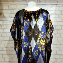 Load image into Gallery viewer, This luxurious kaftan is truly a one of a kind you will feel completely enamored in. Handcrafted using a bold diamond &amp; floral printed vintage velvet fabric is simply all you&#39;ll enjoy feeling, head to toe. Featuring a scoop neckline with an extended shoulder, loose fitting sleeve bands, double slide slits for ease of movement and front patch pockets. Giving all the old school vintage romantic feels, this subtle beauty will turn heads when she enters the room!
