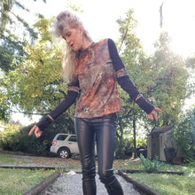 Load image into Gallery viewer, Unique on it&#39;s own or layer up this beauty! A classic fitted mock neck top featuring x-long sleeves, handcrafted in a silky liquid effect floral wave print with ribbed patchwork sleeves, as original as the wearer. Slip this beauty on and set your mark for the day!
