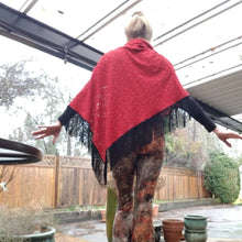 Load image into Gallery viewer, Elevate your look with this one of a kind poncho! The deep red color is perfect for the Fall/Winter season, and heavy lace fabric has a beautiful weighted feel and features a fringed edge that create a very chic and fine finish to any outfit on it&#39;s own or layered over your favorite jean jacket or coat! You will enjoy this piece for year&#39;s to come!
