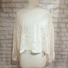 Load image into Gallery viewer, A sweet romantic top for everyday. Featuring a scoop neckline, long balloon sleeves and a loose flowy waist length hemline. Wear freely on it&#39;s own or layer with any of our tops for a unique vintage feeling topper look. Handcrafted in a luscious cream colored corded floral lace, so perfect for day to night in complete romantic style!
