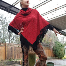 Load image into Gallery viewer, Elevate your look with this one of a kind poncho! The deep red color is perfect for the Fall/Winter season, and heavy lace fabric has a beautiful weighted feel and features a fringed edge that create a very chic and fine finish to any outfit on it&#39;s own or layered over your favorite jean jacket or coat! You will enjoy this piece for year&#39;s to come!
