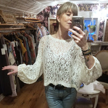 Load image into Gallery viewer, A sweet romantic top for everyday. Featuring a scoop neckline, long balloon sleeves and a loose flowy waist length hemline. Wear freely on it&#39;s own or layer with any of our tops for a unique vintage feeling topper look. Handcrafted in a luscious cream colored corded floral lace, so perfect for day to night in complete romantic style!
