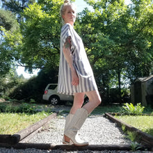 Load image into Gallery viewer, A classic oversized tunic dress for the everyday. This is a 2&quot; shorter version than our regular Banded Freedom Dress. Featuring a scoop neckline with an extended shoulder with loose fitting sleeve bands + patch pockets. Designed for the days spent lounging around the house, playing in the garden, reading a good book + working in your home office, this dress is so versatile. Feel the comfort in this style + the freedom to do it!
