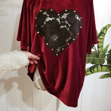 Load image into Gallery viewer, The perfect &#39;romantics&#39; shirt for everyday. Featuring a scoop neckline, elbow length sleeves and a loose flowy hemline. Wear freely on it&#39;s own or tuck it in. Made in an ultra luscious stretch velvet and features a see through lace heart framed with golden studs. So luxuriously soft + comfy you won&#39;t want to take if off!
