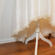 Load image into Gallery viewer, An ultra sweet Hi-Lo styled bridal skirt with elegant scalloped lace hem edge. Featuring a fitted ruched waistband and a fully gathered skirt that flows into a full a-line shaped skirt. The perfect skirt for a Bride-to-be, whether it be a cocktail style wedding, simple country setting, a destination wedding or elopement!
