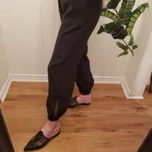 Load image into Gallery viewer, A classic easy fit pant for the everyday. Featuring elasticized waist + ankles as well as pockets in the side seams. Designed for the days spent lounging around the house, playing in the garden, reading a good book + working in your home office, these pants are so versatile. Feel the comfort in this style + the freedom to do it!
