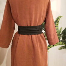 Load image into Gallery viewer, This is a perfectly simple long classic linen belt featuring a wider ruched center panel and 2 narrow pointed belt ends that you can tie multiple ways. This belt is the perfect addition to wrap around any of our linen styles or you can wrap it, knot it, bow it, or tie it any way you like around any of your shirts, blouses, lightweight sweaters, tops or dresses. Create a slimming silhouette today with this great piece!
