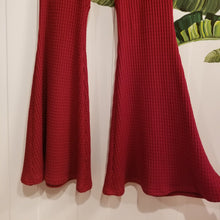 Load image into Gallery viewer, Absolute chic coziness in these must have flares! Featuring a wide waistband, the leg is fitted to the knees and flow out into a super flared hem, just slip on up these classics and have fun mixing + matching them with all of our other knit styles as well as everything else in your wardrobe!
