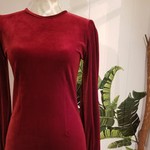 Load image into Gallery viewer, A most luxurious stretch velvet top with an ultra fitted style body and loose bell sleeves creating an ultra flattering sleek fit that&#39;s perfect for wearing casually with jeans, as comfy luxurious loungewear or dressing up and tucking into that favorite holiday skirt. This top is so completely versatile you will enjoy just slipping it on!
