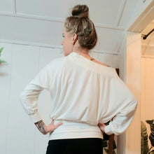 Load image into Gallery viewer, Slip on this ever so soft + cozy organic bamboo rib knit top, featuring a wide boat neckline that makes this an off-the-shoulder baring chic piece, perfect on it&#39;s own or as a staple layering piece. Wear this beauty on or off the shoulder while you work, lounge + play in pure comfort, especially paired with any of our luscious rib knit bottoms it&#39;s the perfect active yet ultra cozy set for all year long!
