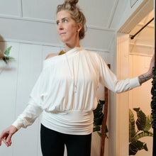 Load image into Gallery viewer, Slip on this ever so soft + cozy organic bamboo rib knit top, featuring a wide boat neckline that makes this an off-the-shoulder baring chic piece, perfect on it&#39;s own or as a staple layering piece. Wear this beauty on or off the shoulder while you work, lounge + play in pure comfort, especially paired with any of our luscious rib knit bottoms it&#39;s the perfect active yet ultra cozy set for all year long!
