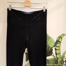 Load image into Gallery viewer, Absolute chic coziness in these must have flares! Featuring a nice wide medium-high rise fit waistband, the leg is fitted to the knees and flow out into a super flared hem, just slip on up these classics and have fun mixing + matching them with all of our other knit styles as well as everything else in your wardrobe!
