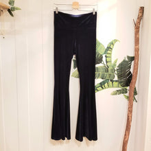 Load image into Gallery viewer, Absolute chic coziness in these must have flares! Featuring a nice wide medium-high rise fit waistband, the leg is fitted to the knees and flow out into a super flared hem, just slip on up these classics and have fun mixing + matching them with all of our other knit styles as well as everything else in your wardrobe!
