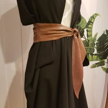 Load image into Gallery viewer, This lovely plush back vegan leather belt features a clean raw finished edge that features gathering at the side seams and 2 pointed tail ends. A great wardrobe staple as you can take this belt style and wrap it, knot it, bow it, tie it any way you like around any of your shirts, blouses, lightweight sweaters, tops or dresses. Create a slimming silhouette today with this great piece!
