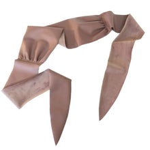 Load image into Gallery viewer, This lovely plush back vegan leather belt features a clean raw finished edge that features gathering at the side seams and 2 pointed tail ends. A great wardrobe staple as you can take this belt style and wrap it, knot it, bow it, tie it any way you like around any of your shirts, blouses, lightweight sweaters, tops or dresses. Create a slimming silhouette today with this great piece!
