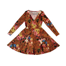 Load image into Gallery viewer, A classic swing dress for everyday! Made in a rich red and gold tone rose print silky knit and featuring a V-neck front, fitted waist and a semi full skirt. It had side pockets and fitted sleeves featuring heart shaped elbow patches in a pearlized pink leather.
